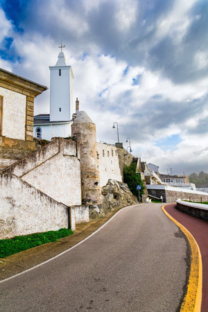 Beautiful road to the Chapel de la Atalaya and Lighthouse. Unusual impressive architecture of the...