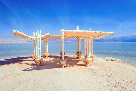 Picturesque round gallery on the seashore. The drainless salt lake Dead Sea in the Middle East. Coast of Israel.の写真素材