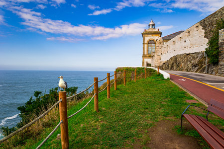 Beautiful road to the Lighthouse. Unusual impressive architecture of the Luarca. Atlantic coast, Asturias. Romantic trip to Spain.の写真素材