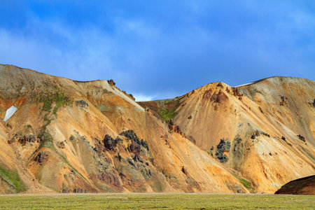 Amazing Iceland - dream for photographers and tourists. Rhyolite mountains, remains of last year's snow and solidified lava flows. Landmannalaugar.の写真素材