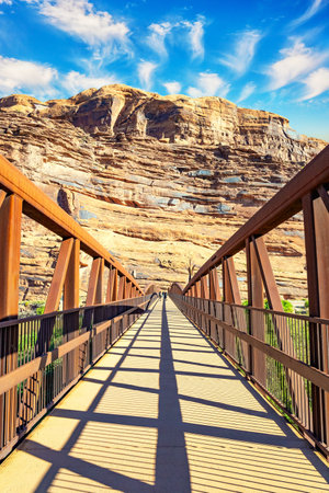 Pedestrian bridge over the Colorado River. The grandiose landscapes of America. Utah Red Sandstones. Fine autumn dayの写真素材