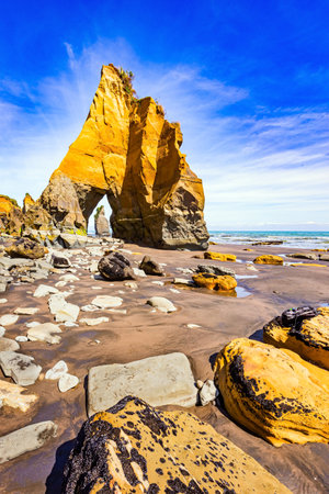 The Tongaporutu beach on the Pacific coast. Low tide on the Pacific coast. Magical journey to the ends of the world. New Zealand. North Island.の写真素材