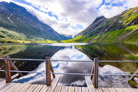 Eidsvatnet - majestic lake in Norway. Deep lake with clean transparent water. The water reflects...