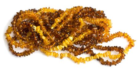 Amber bead necklaces on white backgroundの写真素材