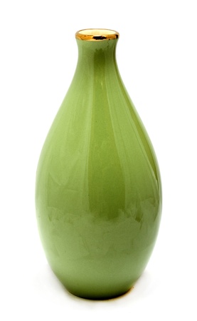 Green vase on white background with natural shadowsの写真素材