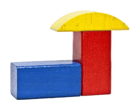 Toy bricks in the shape of a house, isolated on white backgroundの写真素材