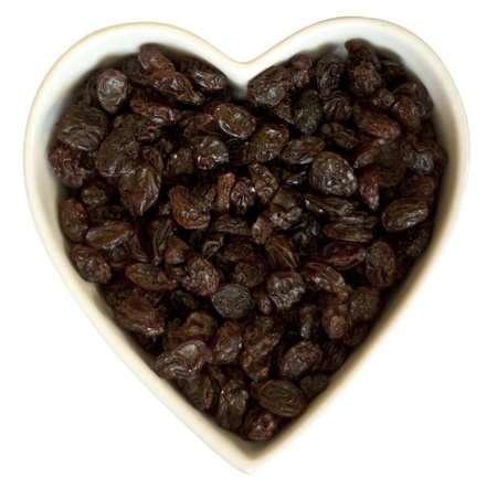 Heart filled with sweet raisinsの写真素材