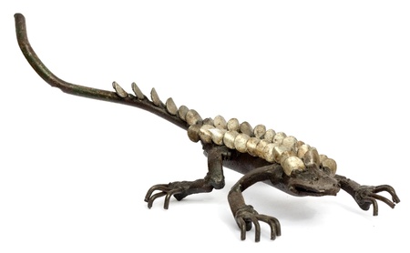 Metallic lizard on the move. African handicraft. の写真素材