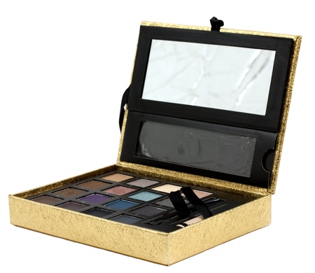 Golden makeup box isolated on white backgroundの写真素材