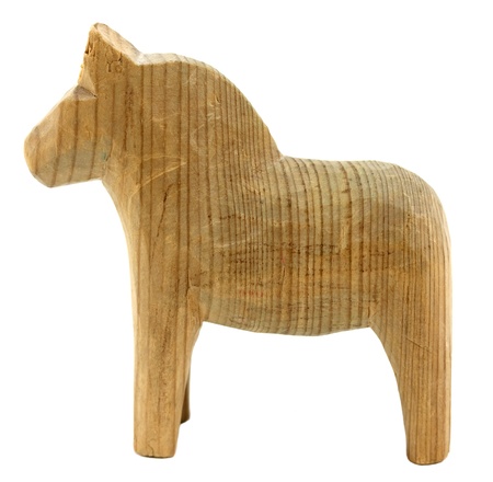 Vintage homemade horse isolated on whiteの写真素材