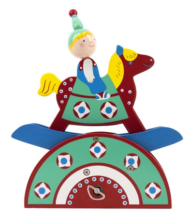 Colorful wooden music box with boy on rocking horseの写真素材