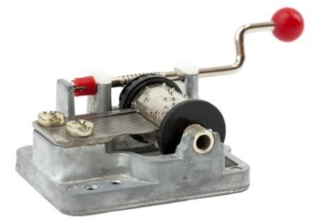 Old fashioned music box isolated on whiteの写真素材