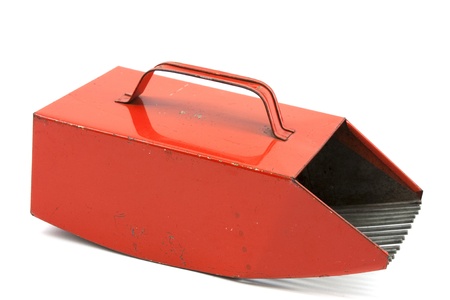 Old orange metal berry picker on whiteの写真素材