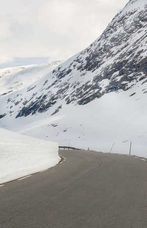 Snowy mountain roads leading to Geiranger, Norwayの写真素材