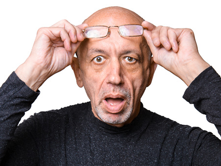 Senior, elderly man in glasses, looking shocked, open mouth isolated on white backgroundの写真素材