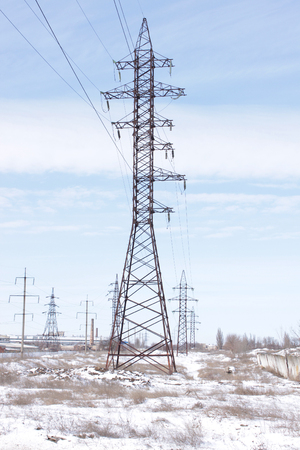 High voltage power tower in winter dayの写真素材