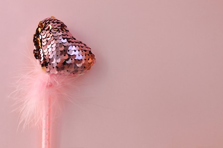 Fairy magic wand on a pink pastel background.の写真素材