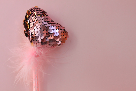 Fairy magic wand on a pink pastel background.の写真素材