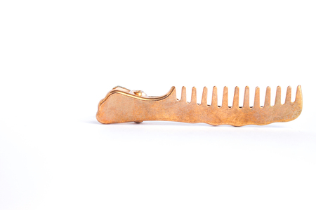 Modern metal barrette hair clip on a white background isolated, hairbrush.の写真素材