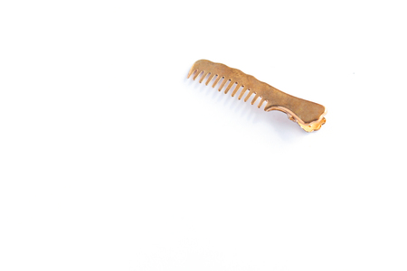 Modern metal barrette hair clip on a white background isolated, hairbrush.の写真素材