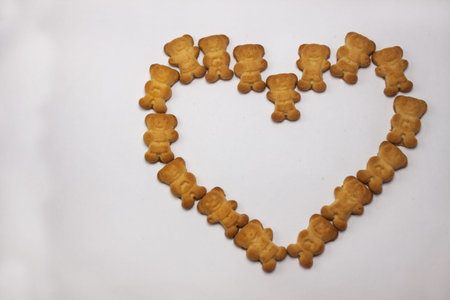 Cute bears cookies heart shaped pattern isolated on white background. Breakfast time for lovers,...