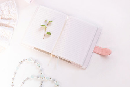 Wedding flat lay, blank notebook mockup, womans stylish accessories in biege colors on white...