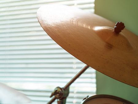 Black drum kit close-up. Musician set with mix of drums in studio. Musical instruments devices for...