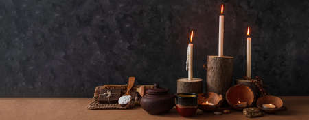 Spa wellness zero waste concept, natural wooden candle holders, coconut shells, peeling sand stone coffee scrub, sea salt, eco friendly wood haircomb. Clean exfoliation products relaxation massage setの写真素材