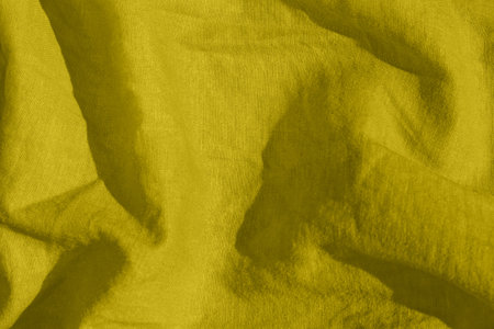 Linen fabric texture top view colors of the year 2021 illuminating yellow and the ultimate gray. Fashion feminine clothes trends. Female blog backdrop design textile surface. Natural eco material.の写真素材