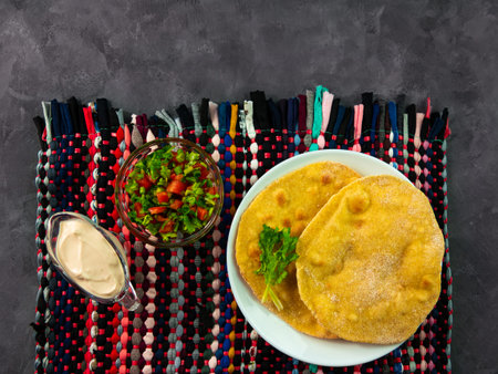 Homemade corn flatbread cilantro green tomato salsa authentic textile. Handmade mexican tortilla...