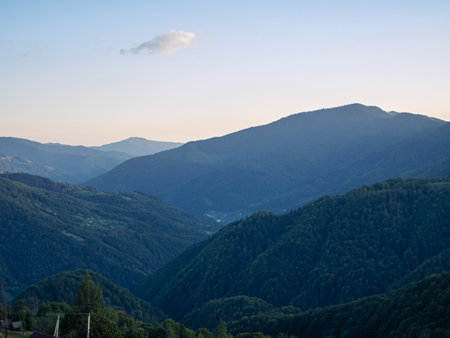 Village in Transcarpathia region scenic Carpathian mountains view Ukraine, Europe. Autumn countryside landscape fall spruce pine trees. Eco Local tourism hiking Recreational activities Vacationの写真素材