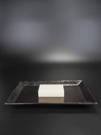 Solid cut rice cake black background