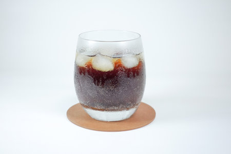 Cola in glass with ice, close upの写真素材