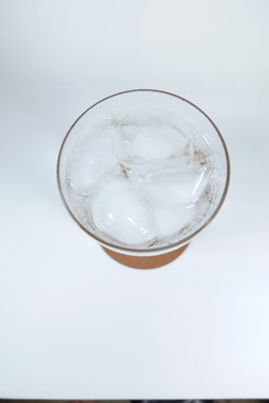 Soda drink in glass with ice, close upの写真素材