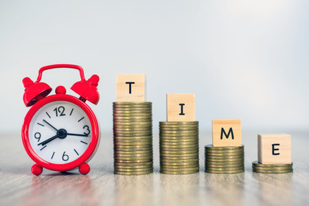 Red alarm clock Coin ladder is labeled as time placed on a pile of coins. Money Saving Ideas...