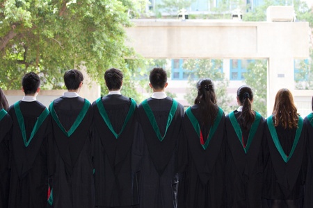 Back of university graduates with their gownsのeditorial素材