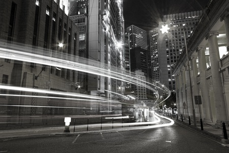 Traffic in city at night in black and white tonedの写真素材