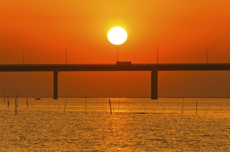 Sunset over a bridge in Hong Kongの写真素材