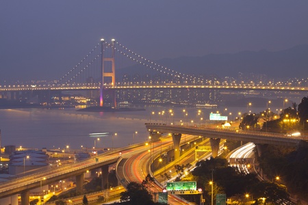 Tsing Ma Bridge and highway at sunset, show the modern landscape of Hong Kong.の写真素材