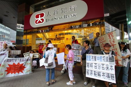 HONG KONG - OCT 21, Occupying Central enters seventh day in Hong Kong on 21 October, 2011. The procession continues to Tai Seng Bank to ask for money refund of Lehman Brothers incident.のeditorial素材