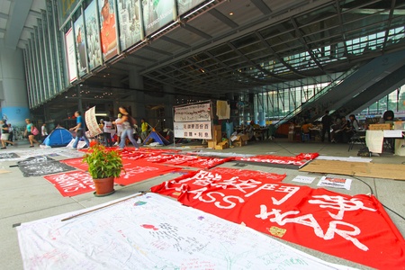 HONG KONG - OCT 20, Occupy Central Hong Kong Protesters enter their sixth day in Central, Hong Kong on 20 October, 2011. It is the event to cooperate with Wall Street campaign in USA to question about capitalism. About 200 people gathered and set up tentsのeditorial素材
