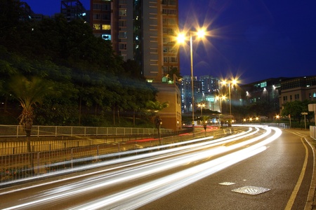 Traffic in city at nightの写真素材