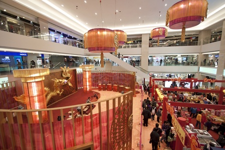 HONG KONG - JAN 13, Tuen Mun Town Center Shopping mall in Hong Kong on 13 January, 2012. There are many booths selling Chinese New year food.のeditorial素材