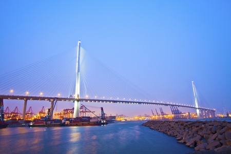 Hong Kong bridge at sunsetの写真素材