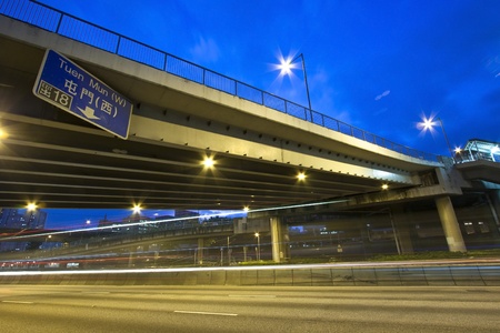Traffic in Hong Kong freeway at nightの写真素材