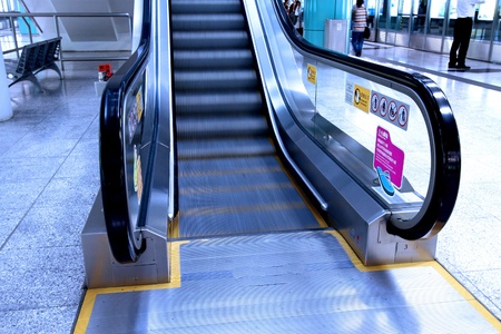 Moving escalator in blue toneのeditorial素材