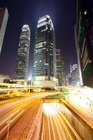 Traffic in modern city at nightの写真素材