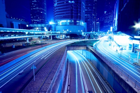 Traffic through downtown of Hong Kong at nightの写真素材