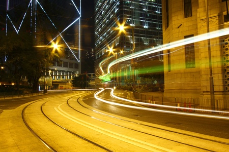 Traffic through downtown of Hong Kong at nightの写真素材