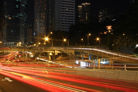 Traffic through downtown of Hong Kong at nightの写真素材